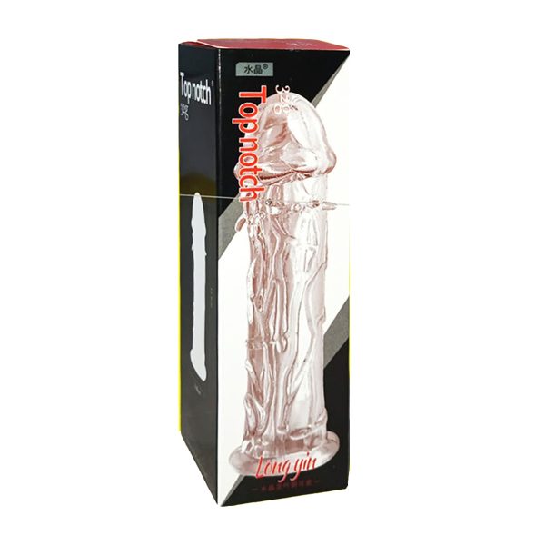 Clear plastic penis displayed in a box labeled "Topnotch Long Gin Magic Condom.