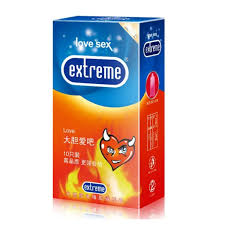 A box of Extreme Love condoms featuring a red devil design, containing 12 pieces for enhanced pleasure.