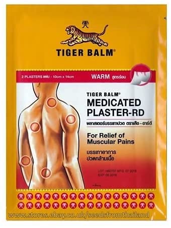 Tiger Balm medicated plaster package, featuring two 10 x 14 cm sheets for pain relief.