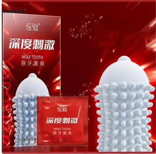 A white and red sex toy alongside a red box labeled "YUMI Deep Stimulation Wolf Tooth Refreshing Condom 10pcs.