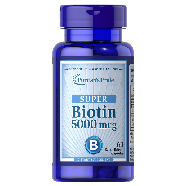 Puritan's Pride Biotin 5000 mcg supplement, 60 softgels, promoting healthy hair, skin, and nails.