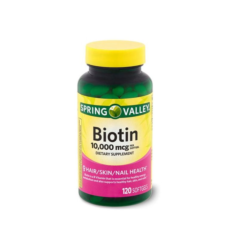 Spring Valley Biotin supplement bottle, 10000 mcg, containing 120 capsules for hair, skin, and nail health support.