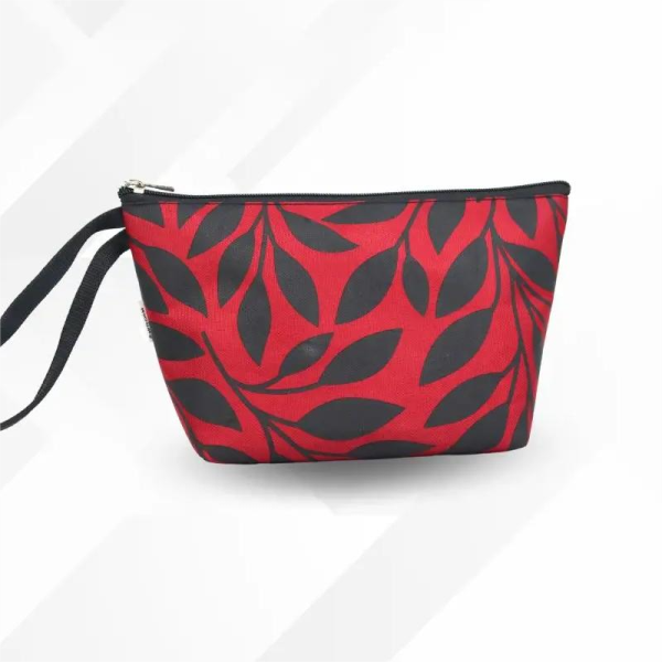 A maroon pouch makeup bag featuring a red and black leaf design, ideal for storing cosmetics and personal items.