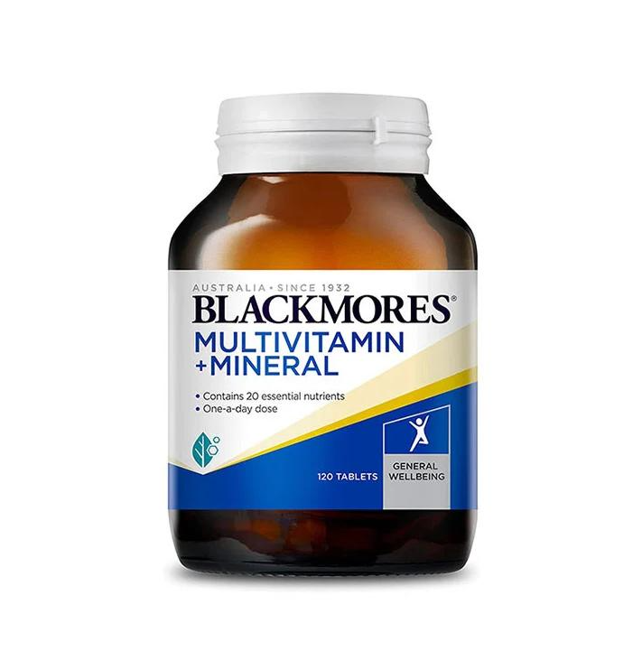 460 (1) Blackmore's multivitamin and mineral supplement bottle with a dark label and colorful design, promoting health and wellness.