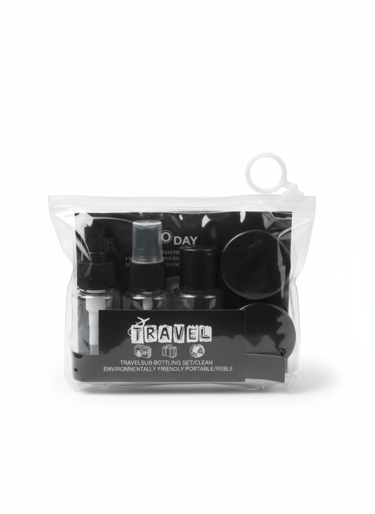 A black and white bag containing a refillable travel bottle kit with a bottle of perfume, designed for cosmetics.