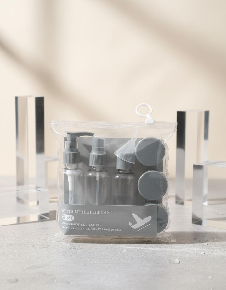 22 (1) Eight-piece Ash travel bottle kit with four refillable containers and one small liquid bottle for cosmetics.