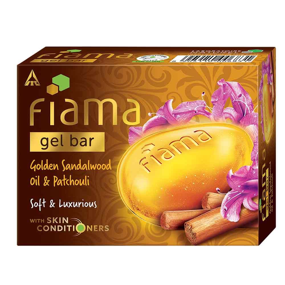 Fiama gold and cinnamon soap bar, featuring sandalwood oil and patchouli, presented in a luxurious 125g gel format.