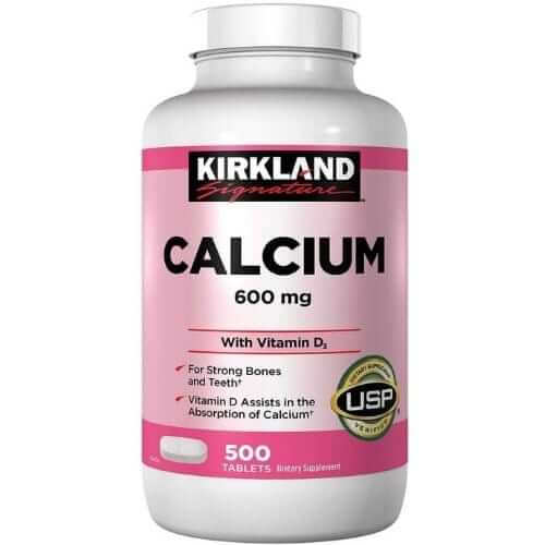 Kirkland Signature Calcium 600 mg with Vitamin D3, 500 tablets in a bottle, promoting bone health and strength.