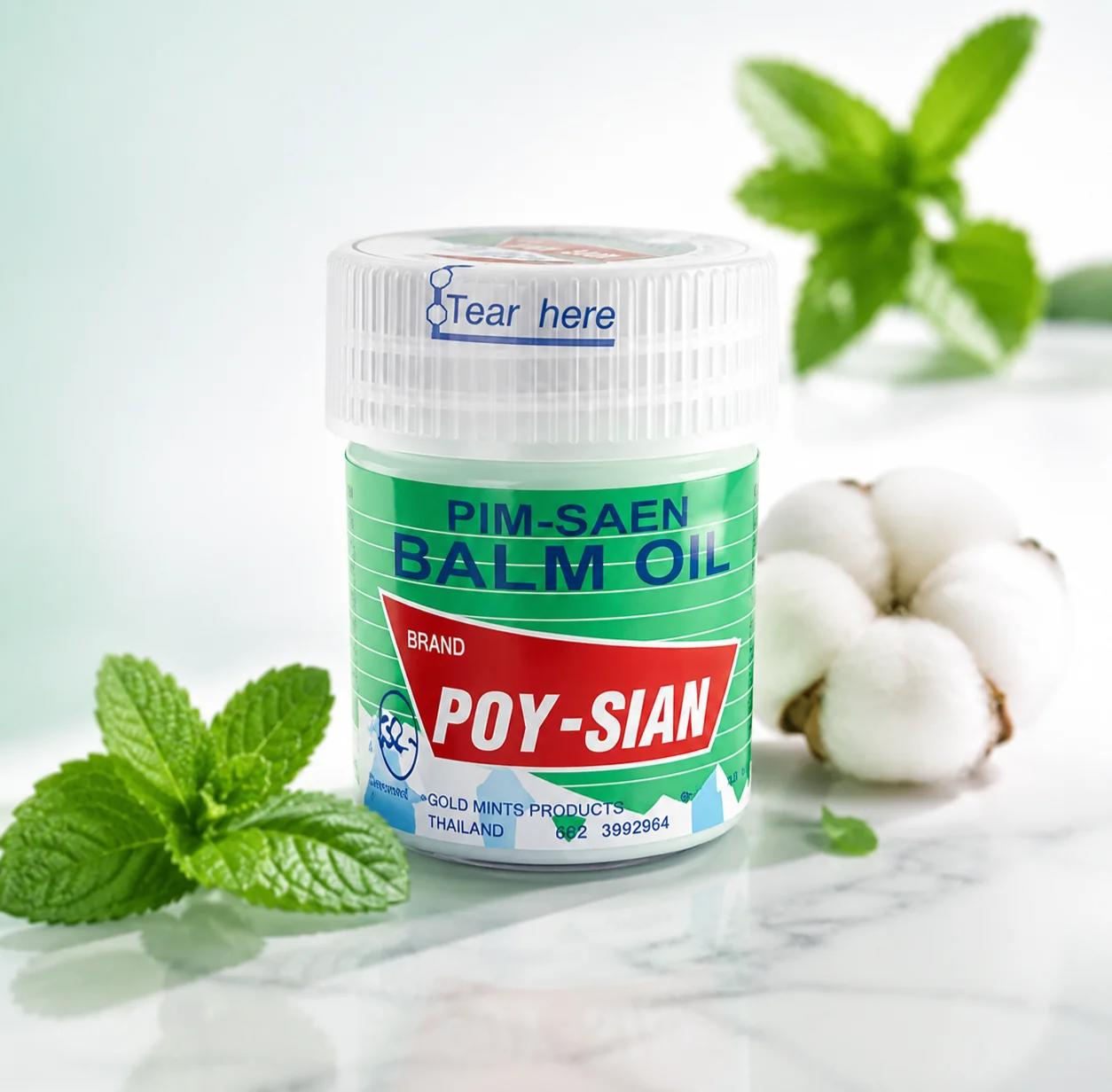 641 An 8ml jar of Poy-Sian Thai Pim-Saen Balm Oil placed on a white plate, showcasing its minty green color.